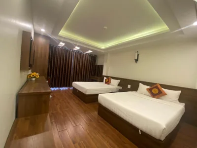 Chambre Quadruple avec Salle de Bains Privative — MAI VANG Hotel